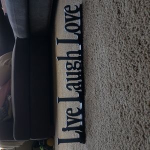 "Live Laugh Love" sign